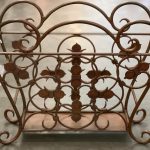Antique wrought iron magazine holder