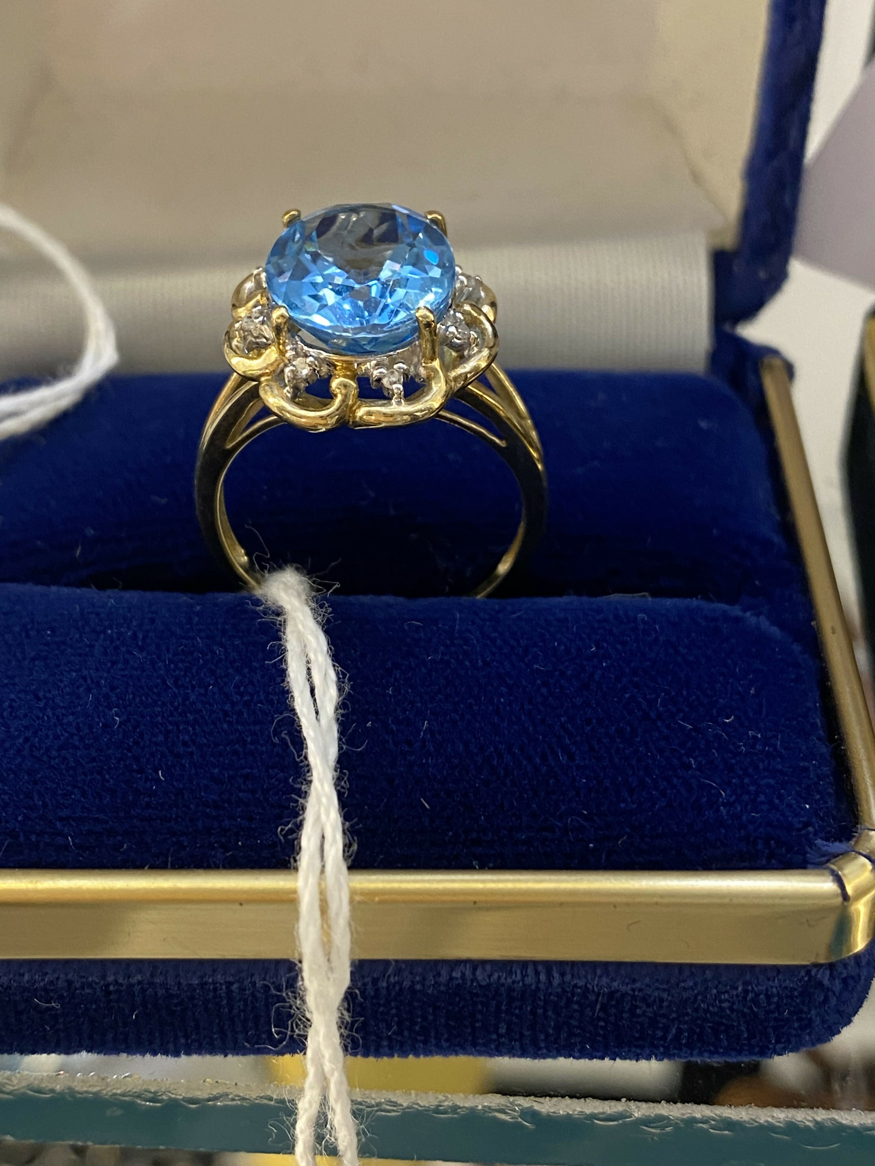 Blue Topaz and Diamond Ring