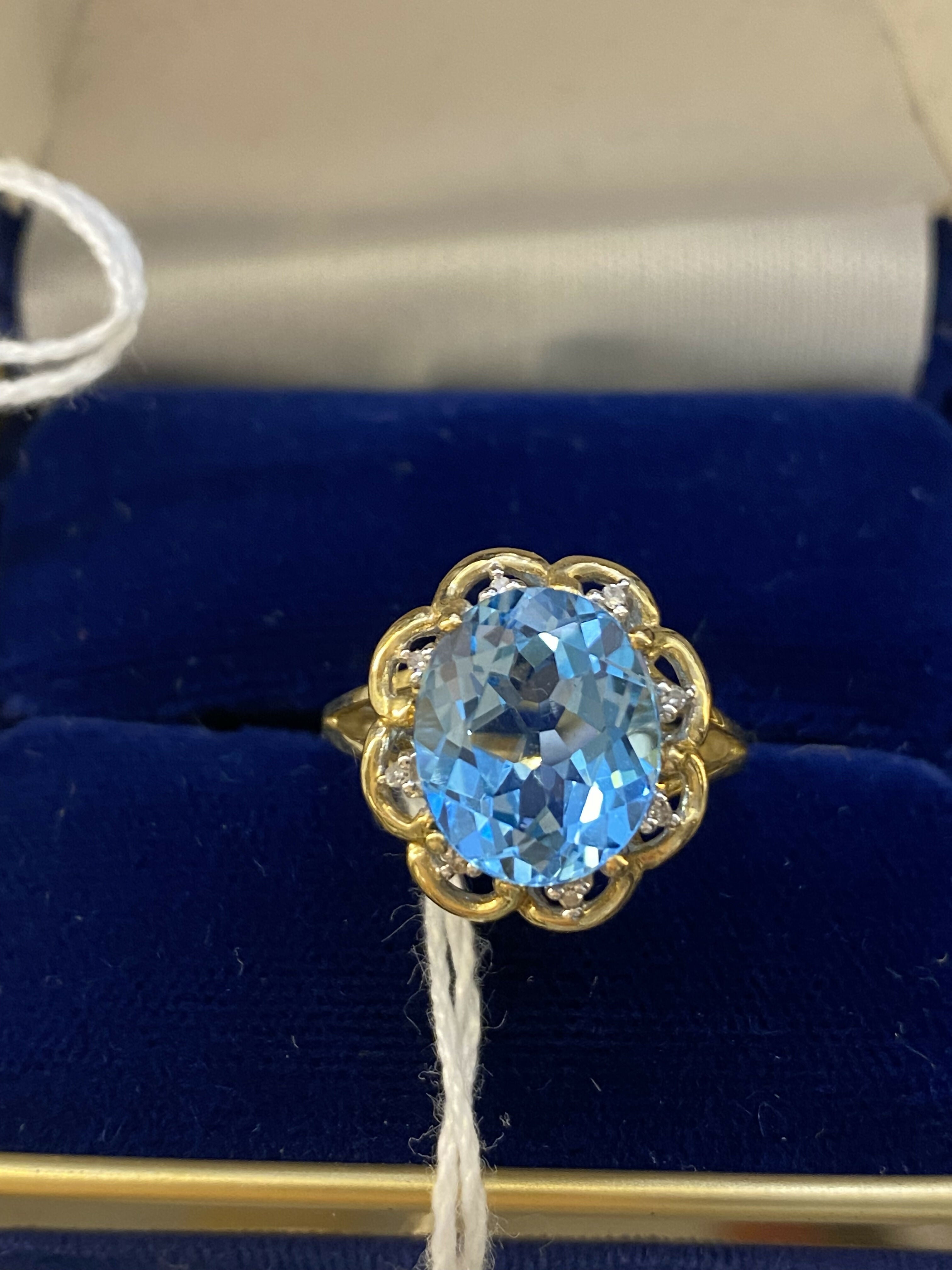 Blue Topaz and Diamond Ring